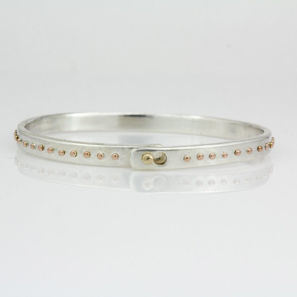 Silver and Rose Gold Ellipsis Beach Bangle